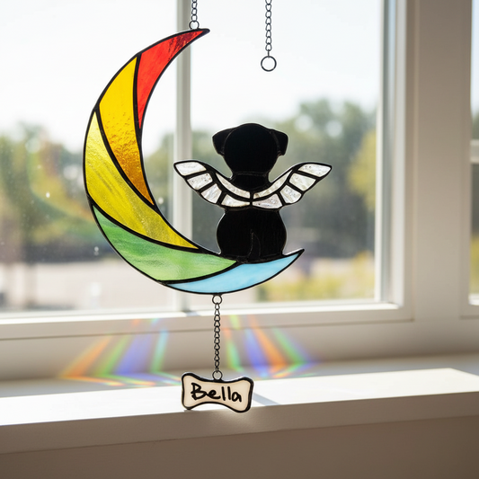 Stained glass black cat on a rainbow moon with packaging and a letter.
