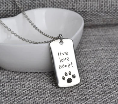 "Live Love Adopt" Silver Rescue Necklace with Cutout Paw Detail