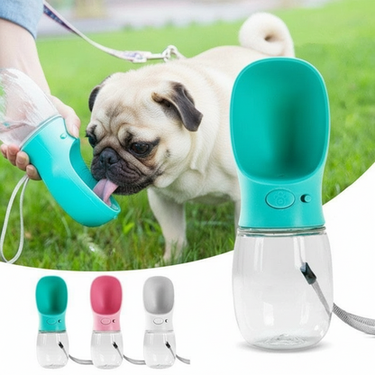 Pet water bottle with a dog drinking from it, set against a grassy background.