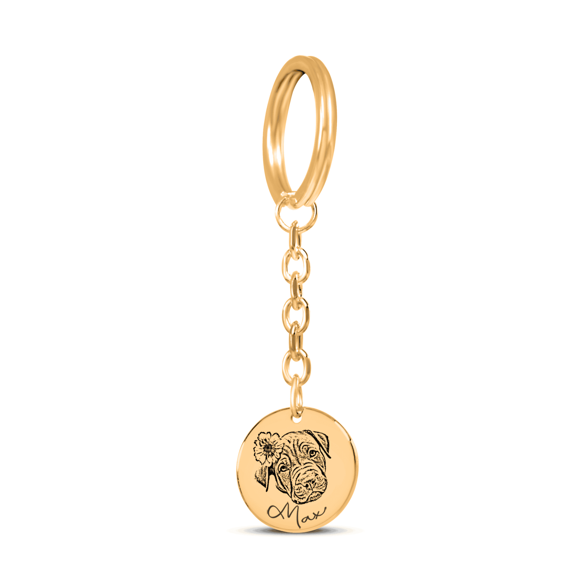 Gold keychain with a dog face charm and 'Mom' engraving on a white background