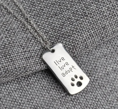 "Live Love Adopt" Silver Rescue Necklace with Cutout Paw Detail